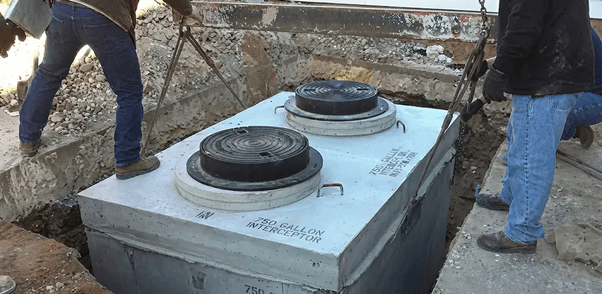 Grease trap installation for a commercial property drainage system in West Palm Beach, FL