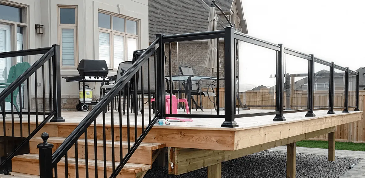 Handrail installation on a deck staircase for safety and code compliance in West Palm Beach, FL